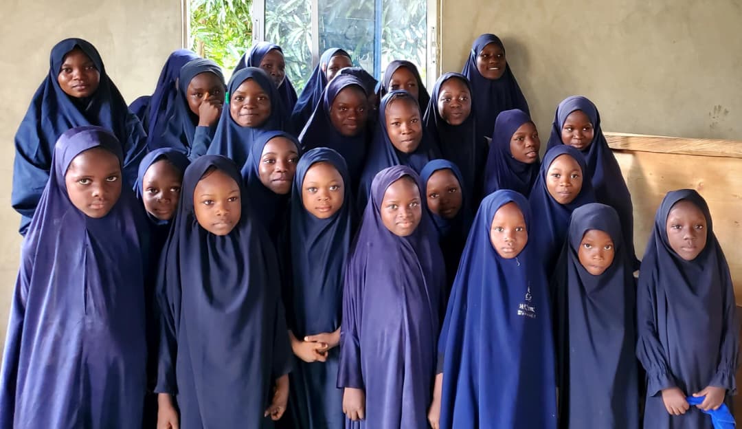 Students pictured within the school environment